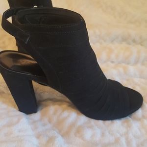 Carlos Santa.  Black OPEN shoes